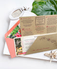 Load image into Gallery viewer, Retro Floral Boarding Pass Wedding Invitation (Oahu, HI)
